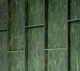 An angled, zoom photograph of timber wall panelling with a dark green wood stain.