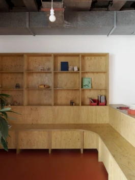 yellow stained timber joinery item in a youth centre